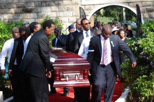 People carrying the casket of Mwangi and his fiancee Rosemary. Photo AFP