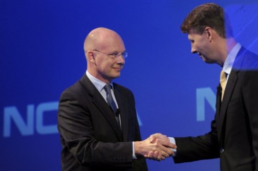 Nokia's new CEO Timo Ihamuotila (L) shakes hands with Nokia's Chairman of the Board Risto Siilasmaa during the press conference of the Finnish mobile manufacturer Nokia in Espoo on September 3, 2013. Nokia announced the sale of its mobile phone unit to Microsoft for 5.44 billion euros (7.17 billion US dollars), bringing to an end its days as a phone maker.