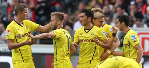 Dortmund players celebrate with thier Armenia midfielder
