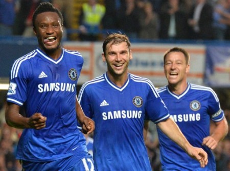 Chelsea's Nigerian midfielder John Mikel Obi (L) celebrates with Chelsea's Serbian defender Branislav Ivanovic (C) and Chelsea's English defender John Terry (R) . AFP