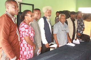 Prof Wole Soyinka (4L) with other writers