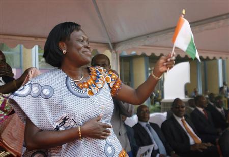 Simone, wife of Ivory Coast’s President Laurent Gbagbo, gestures during the opening ceremony of celebrations marking the 50th anniversary of the country’s indepedence in Abidjan