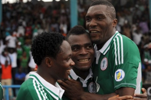 Nigeria's Emmanuel Emenike (C) celebrates with his teammates Ahmed Musa (L) and Emmanuel Egwuekwe after scoring during the FIFA World Cup qualifying football match . AFP