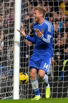 Chelsea's German striker Andre Schurrle celebrates scoring the opening goal