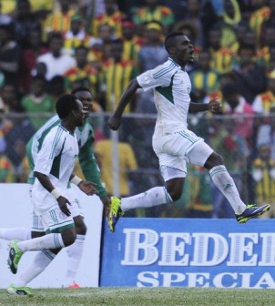 Emmanuel Emenike, right, jumps for joy after scoring in Addis Ababa