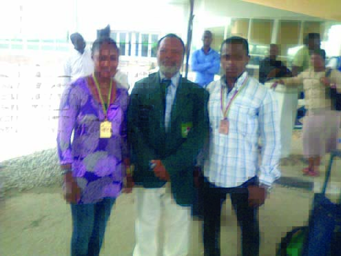 L-R Gold medalist, Esther Augustine, Coach Ihaza and bronze medal winner, Eniafe Solo