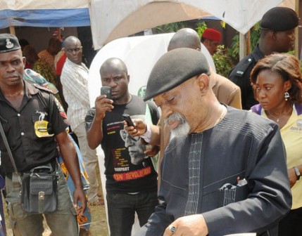 Chris Ngige at a voting centre Saturday: says poll a mockery of democracy