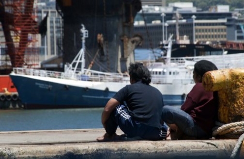 two of the Indonesian fishermen stranded in South Africa. AFP