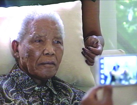 A picture released by South African broadcaster SABC shows South African peace icon Nelson Mandela sitting at his home in Johannesburg on April 29, 2013.  Nelson Mandela was critically ill in hospital on June 24, 2013 after his condition suddenly deteriorated, leaving South Africans anxiously awaiting the latest news of their revered anti-apartheid icon. 