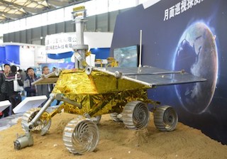a model of a lunar rover known as The Yutu, or Jade Rabbit on display at the China International Industry Fair 2013 in Shanghai. AFP