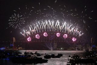 New Year's Eve fireworks erupt over Sydney's iconic Harbour Bridge on January 1, 2014. Tonnes of explosives lit up Australia's biggest city,