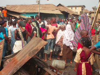 A crowd at the scene of the tragedy