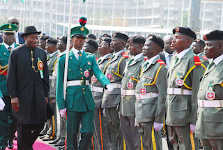 President Goodluck Jonathan inspects a guard of honour