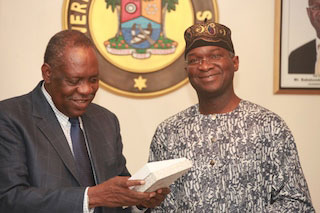 Fashola(right) with Isa Hayatou