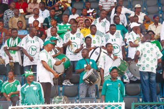 Nigerian Supporters Club supported the home-based Eagles against Mali in the opening match of the 2014 African Nations Championship (CHAN) Mali beat Nigeria 2-1