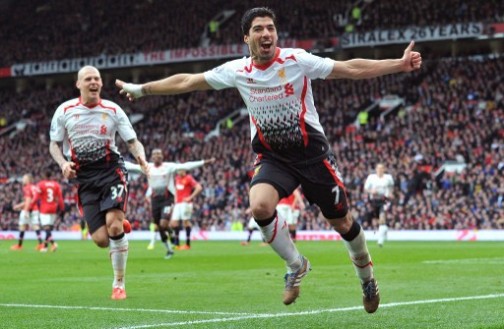 Suarez dashes for joy after scoring against United at Old Trafford