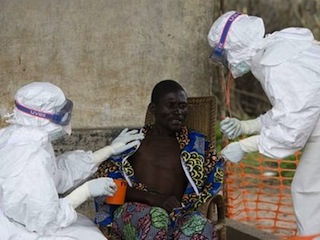 Doctors attending to an Ebola virus victim