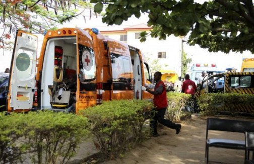 A Red Cross vehicle brings victims to the Asokoro General Hospital