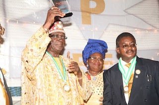 L-R: Oba Josiah Bamidele Otukoya, his Olori and Chief Olusegun Osideko