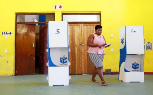 A woman goes to cast her ballot