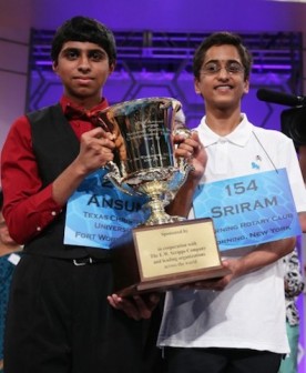 Sriram Hathwar (R) of Painted Post, New York and Ansun Sujoe (L) of Fort Worth, Texas hold their trophy at the end of the 2014 Scripps National Spelling Bee competition May 29, 2014