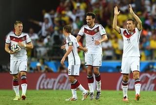 Germany's forward Miroslav Klose (R) celebrates with teammates