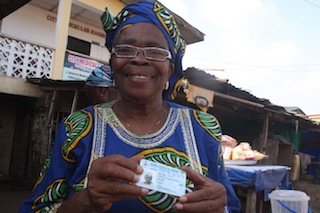 Madam Elizabeth Adaramola display her voters card.1