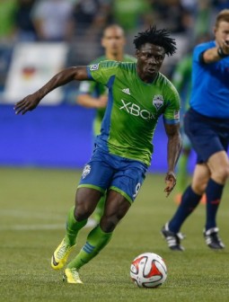 Martins #9 of the Seattle Sounders dribbles against the Portland Timbers
