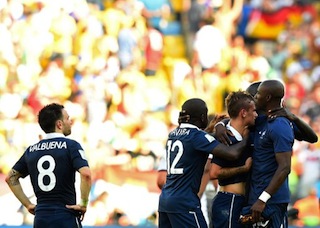 France's team react after losing