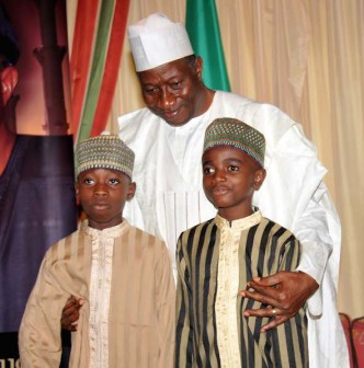 Jonathan in photo shoots with two kids living in Abuja