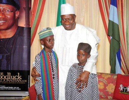 Another two kids take their turn for photo-ops with President Jonathan