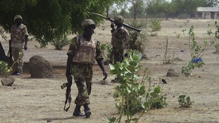 Nigerian troops comb a village in Maiduguri