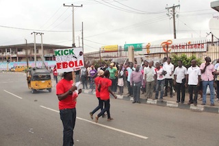 A Nigerian campaigning to rise awareness on Ebola virus in the street of  Lagos.