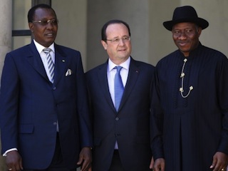 File Photo...L-R: President Idriss Deby of Chad; French President Francois Hollande and President Goodluck Jonathan during a meeting on terrorism in Paris