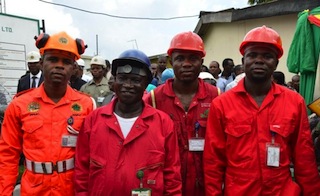 FILE PHOTO: Nigerian oil workers