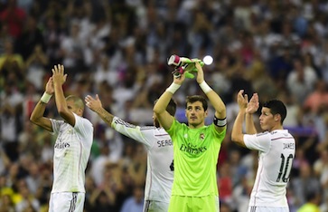 Real Madrid players applaud supporters after beating Barcelona