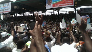 Buhari acknowledges cheers from supporters