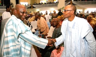 Presidential Hand Shake: L-R: Atiku Abubakar and General Muhammadu Buhari shake hands