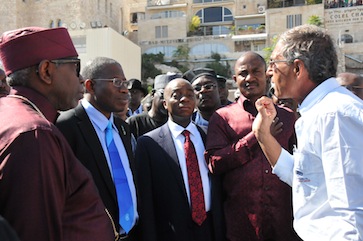 PRESIDENT, CHRISTIAN ASSOCIATION OF NIGERIA (CAN) PASTOR AYO ORITSEJAFOR; PRESIDENT GOODLUCK JONATHAN; PRESIDENT, LIVING FAITH CHURCH WORLD-WIDE, BISHOP DAVID OYEDEPO; EXECUTIVE SECRETARY NIGERIACHRISTIAN PILGRIMS COMMISSION, (NCPC) MR JOHNKENNEDY OPARA AND A TOUR GUIDE DURING THE VISIT OF THE PRESIDENT TO THE WAILING WALL IN JERUSALEM ON SATURDAY (25/10/24)