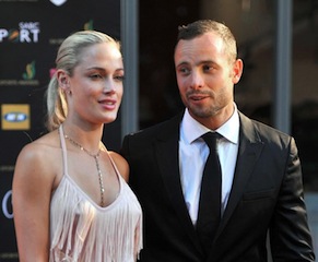 South Africa’s Olympic sprint star Oscar Pistorius and Reeva Steenkamp attend the Feather Awards held at Melrose Arch in Johannesburg on November 4, 2012