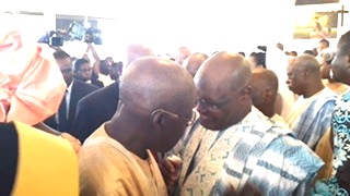 Close and Personal: L-R: Asiwaju Bola Tinubu and Atiku Abubakar exchange pleasantries