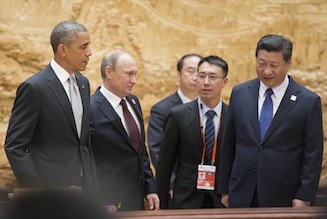 US President Barack Obama (L), Russia's President Vladimir Putin (2nd L) and China's President Xi Jinping (R) arrive to attend the Asia-Pacific Economic Cooperation (APEC) Summit plenary session at the International Convention Center in Yanqi Lake, north of Beijing