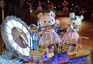 Hello Kitty (L) and her twin sister Mimmy (R) celebrate in the Hello Kitty 40th anniversary parade