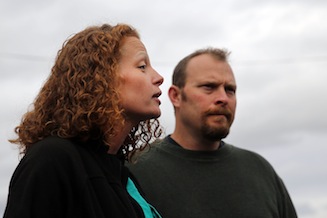 Kaci Hickox stands with her boyfriend Theodore Michael Wilbur as she gives a statement to the media in front of her home