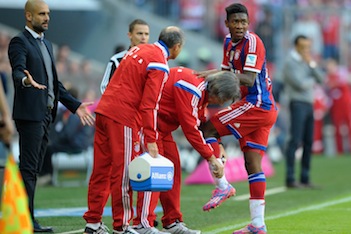 David Alaba receives medical treatment from Bayern Munich doctors  Photo: Getty Images