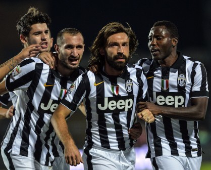 Juventus' midfielder Andrea Pirlo (C) celebrates with teammates afer scoring during the Italian Serie A football match Empoli 