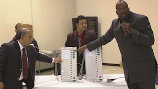 Namibia election commissioner demonstrates how to use e-voting