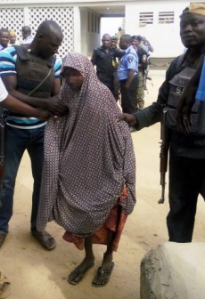 FILE PHOTO: Police in custody of a female suicide bomber, Zahra'u Babangida