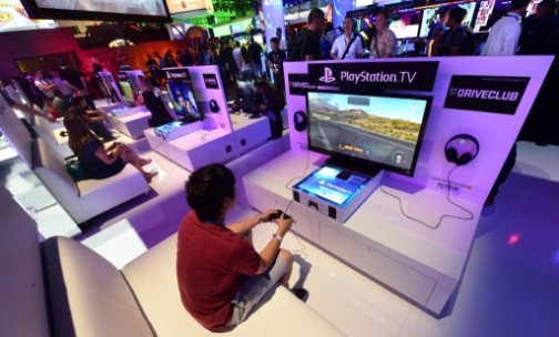 People testing the Sony Playstation in June. The playstation suffered online outage on Christmas day