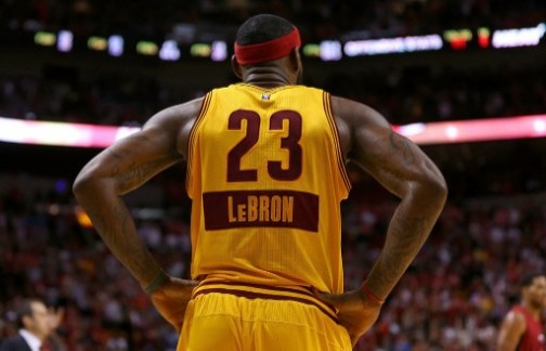 LeBron James watches as his team flounders in Miami